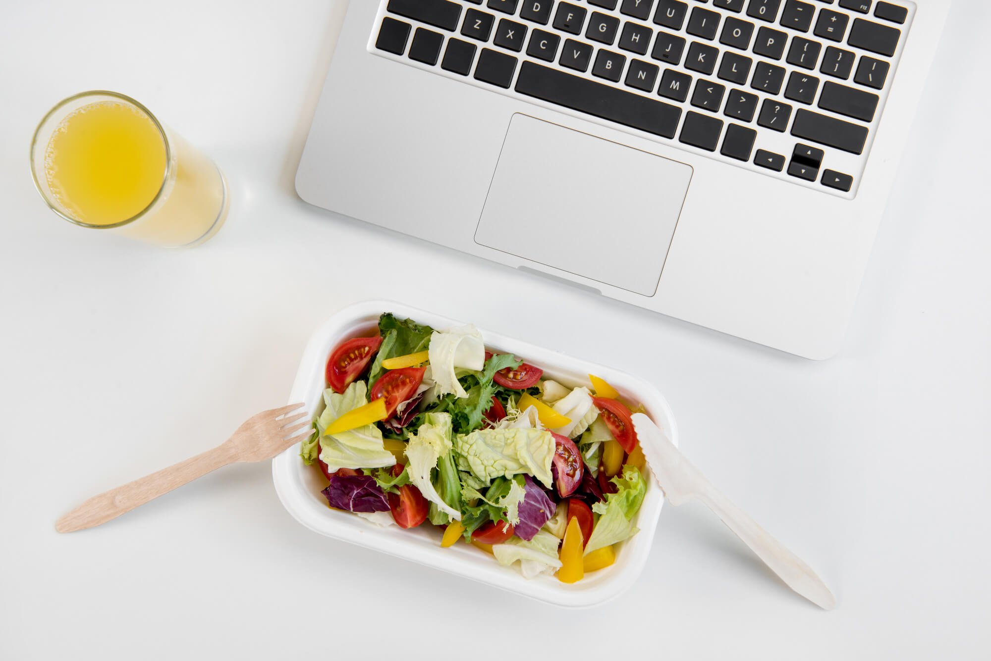 salad in front of computer